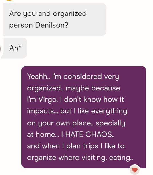 A dating-app chat where Denilson answers a question about being organized with a long, rambling English reply